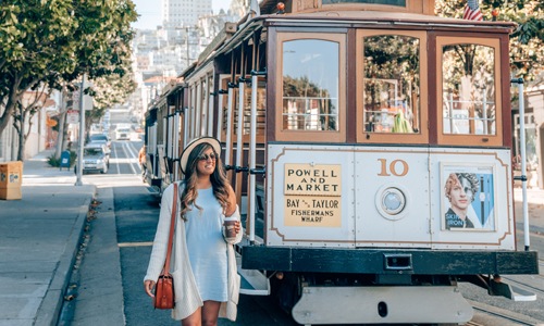 a person standing next to a trolley